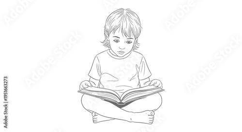 Young child engrossed in reading a book while sitting cross-legged.