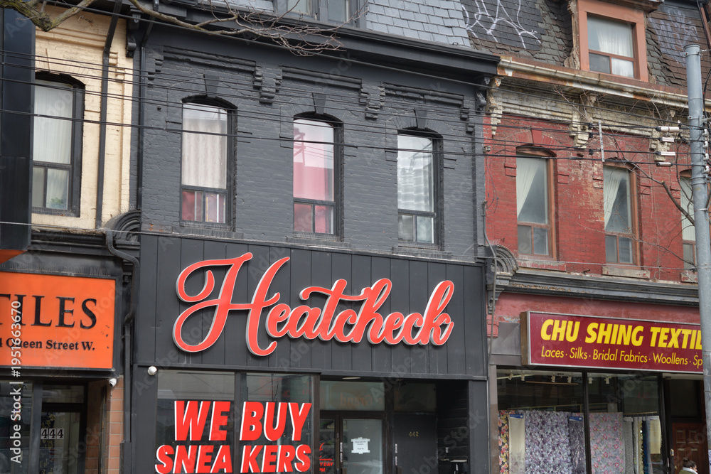 Fototapeta premium exterior of Heatcheck, a shoe store, located at 442 Queen St W, Toronto
