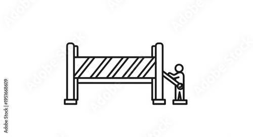 Construction worker installing temporary traffic barrier for road safety.