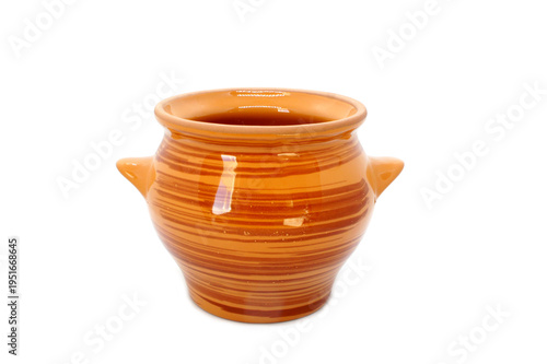 Ceramic baking pot isolated on white background. Ceramic tableware with glaze. Classic Clay pot. Heat-resistant Earthenware. 