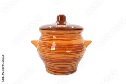 Ceramic baking pot with lid isolated on white background. Ceramic tableware with glaze. Classic Clay pot. Heat-resistant Earthenware. 