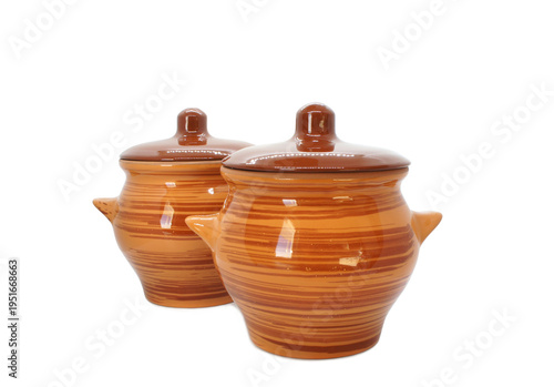 Two Ceramic baking pots with lid isolated on white background. Ceramic tableware with glaze. Classic Clay pots. Heat-resistant Earthenware. 