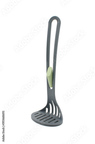 Plastic Potato masher isolated on white background. Modern cooking accessory.