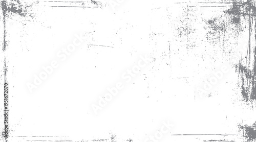 Grey distressed texture overlay with scattered dots and scratches on white background. Grungy border effect