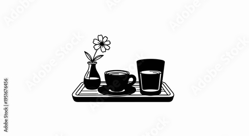 A small vase with a flower, a coffee cup, and a glass of water on a tray