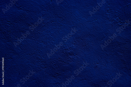 Vibrant Deep Blue Textured Wall Background for Design and Decoration