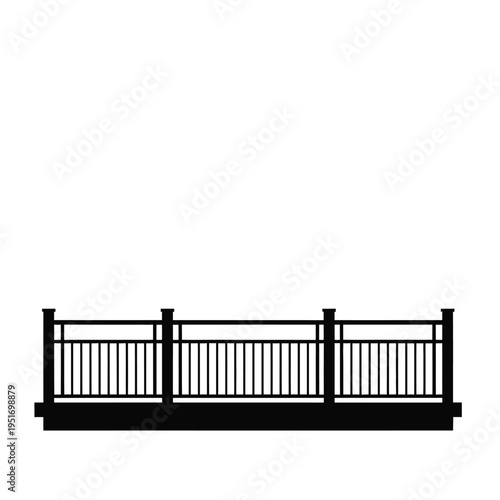 Black metal railing with vertical balusters and flat rail