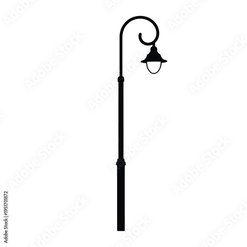 Black street lamp post with curved arm and lantern