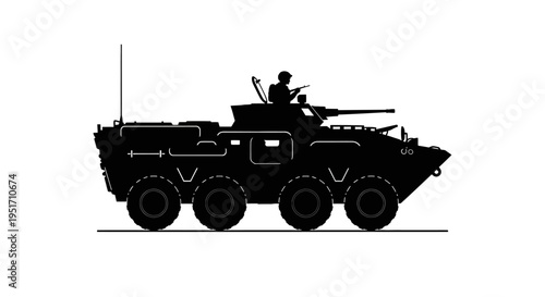 Silhouette of a military armored vehicle with a soldier on top armed and ready for action in a combat situation