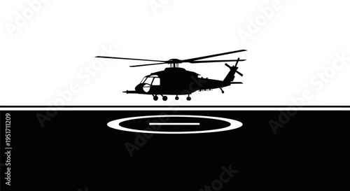 Black helicopter silhouette hovers above a helipad at night with white markings on a dark surface