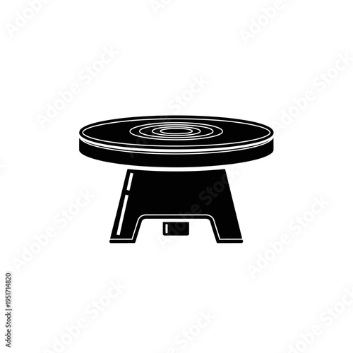 Silhouette of a Metal Banding Wheel Turntable for Pottery Glazing, Symbolizing Ceramic Arts and Sculptural Craftsmanship.