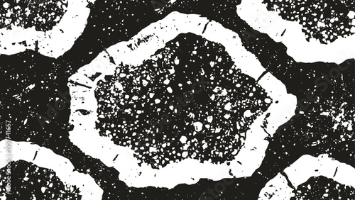 Black and white abstract textured pattern with irregular circular shapes and grainy details