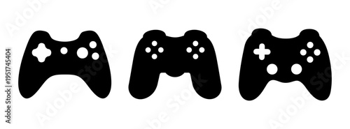 Three black game controller icons vector illustration for video game design and console art use