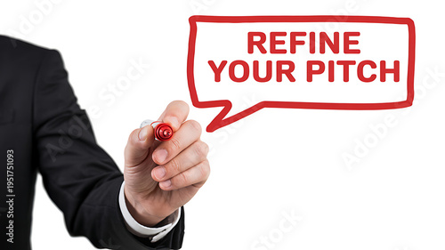 Businessman refining pitch with marker on whiteboard
