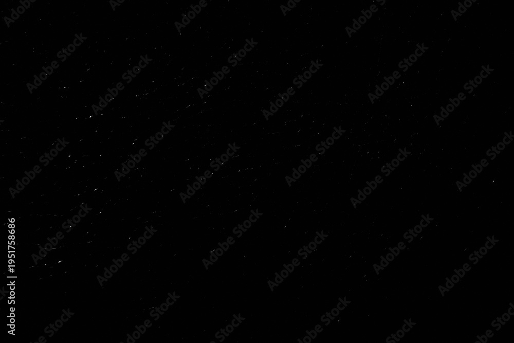 Obraz premium Grunge overlay effect with scratch and dust on black. background, retro noisy grain dust texture for film or photo overlay, old photo overlay texture, black grainy background