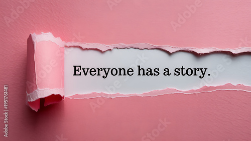 Torn pink paper revealing text quote 