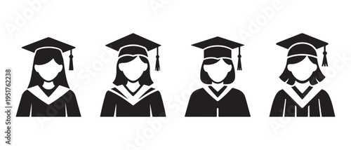 Four female graduates in academic regalia standing in a row.