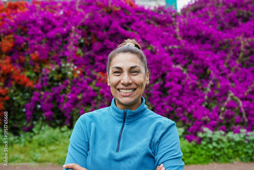 Portrait of mature latin woman smiling on camera outdoor - Elderly person, lifestyle and happiness concept