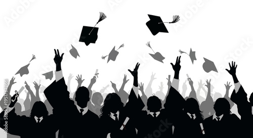 Graduates celebrate commencement with tossed caps.