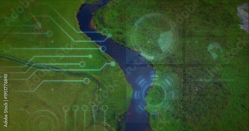 Winding river running through pasture, tech scan activating circuit HUD overlays mapping wetland