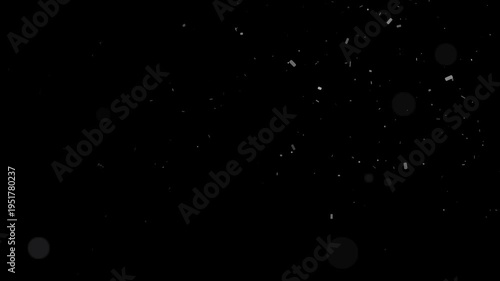 Slow motion dust particles and glowing bokeh lights floating on dark atmospheric background animation loop