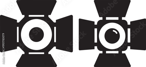 Two spotlight icons representing lighting equipment for film, stage, or photography studio setups