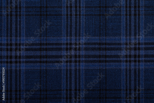 Seamless blue plaid textile pattern with intersecting dark lines, ideal for backgrounds, fashion, textiles, and design projects.