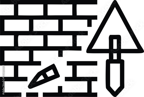 Essential construction tools like a trowel and bricks for building a wall