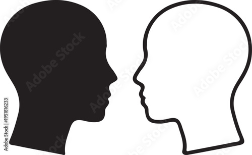 Two profile head silhouettes one black and one white outline representing communication contrast and diversity