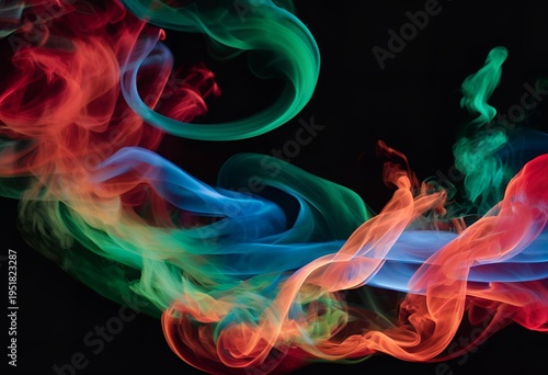 Vivid colorful smoke swirling on dark background.
