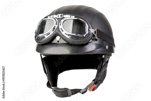 Vintage motorcycle helmet with goggles ready for adventure on open roads and winding paths. Isolated on white background.