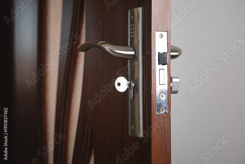 House keys on the door. Security. Real estate