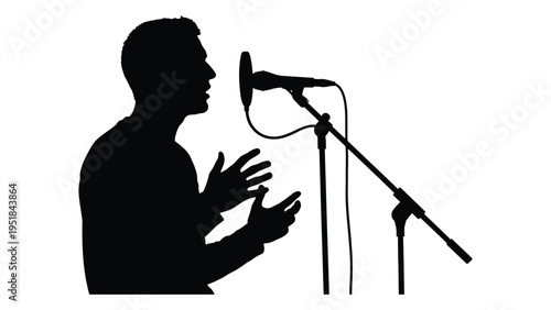 A man singing into a microphone