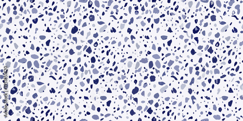 Abstract pattern of scattered blue and lavender shapes on white