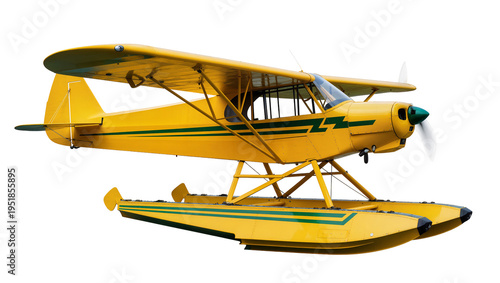 Fotografie Vibrant yellow single-engine floatplane, a classic seaplane with green stripes a