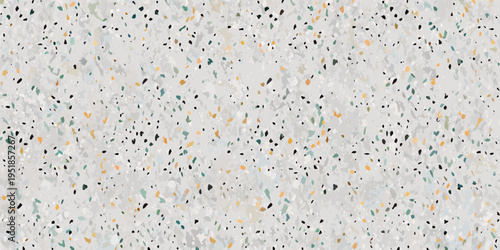 Detailed terrazzo pattern with scattered colorful flecks on a light background