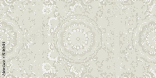 Subtle floral medallion pattern in shades of gray and off white