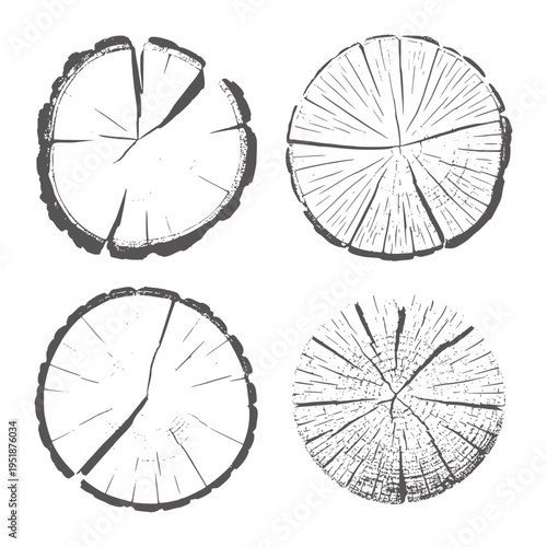 Four black and white wood log cross sections with visible rings and bark texture