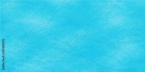 This abstract blue grunge background features a vintage paper texture with aged paint patterns and a rough light blue watercolor design on a blank canvas backdrop