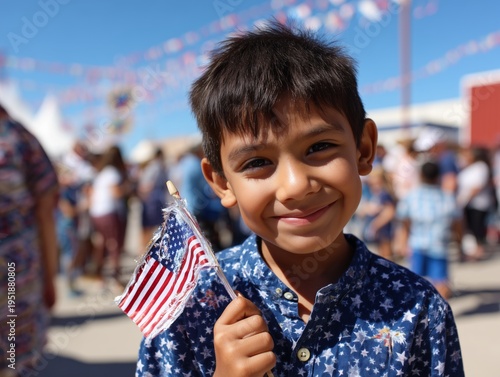 Child Holds American Flag During Celebration at Community Event in the United...