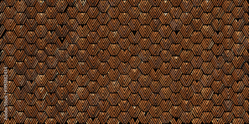 Close up of a brown woven texture resembling roof tiles or basketry