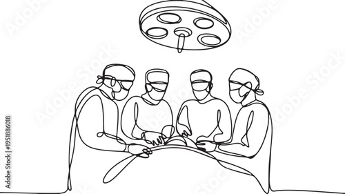 Surgical team performing operation under surgical light
