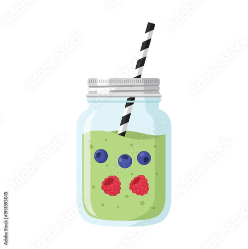 A vibrant green smoothie with blueberries and raspberries in a mason jar with a striped straw
