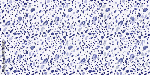 Abstract pattern of irregular blue spots on a white background