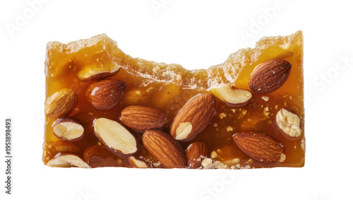 Fotografie Delicious golden almond brittle bar, a sweet and crunchy snack with whole and br