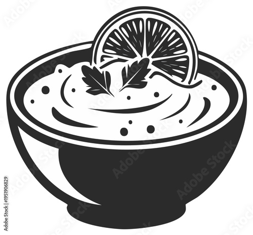 Creamy white dip garnished with fresh parsley and a lemon slice ready to serve in a stylized graphic