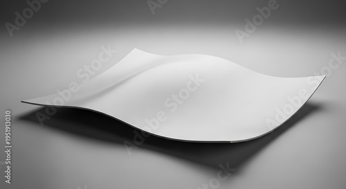 Curved white sheet of paper with wavy edges and subtle shadowing effect visible