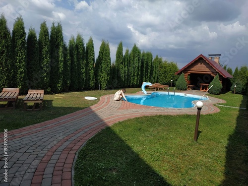 house in the park, a resort wiht pond