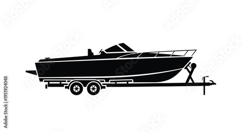 A sleek black silhouette depicts a motorboat resting on a trailer showcasing its streamlined design and maritime utility