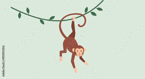 Brown monkey hanging from branch upside down.